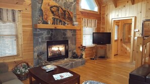 TV, fireplace - Crazy Wolf is a cozy 2 bedroom cabin close to the heart of Maggie Valley, Htub (Maggie Valley)