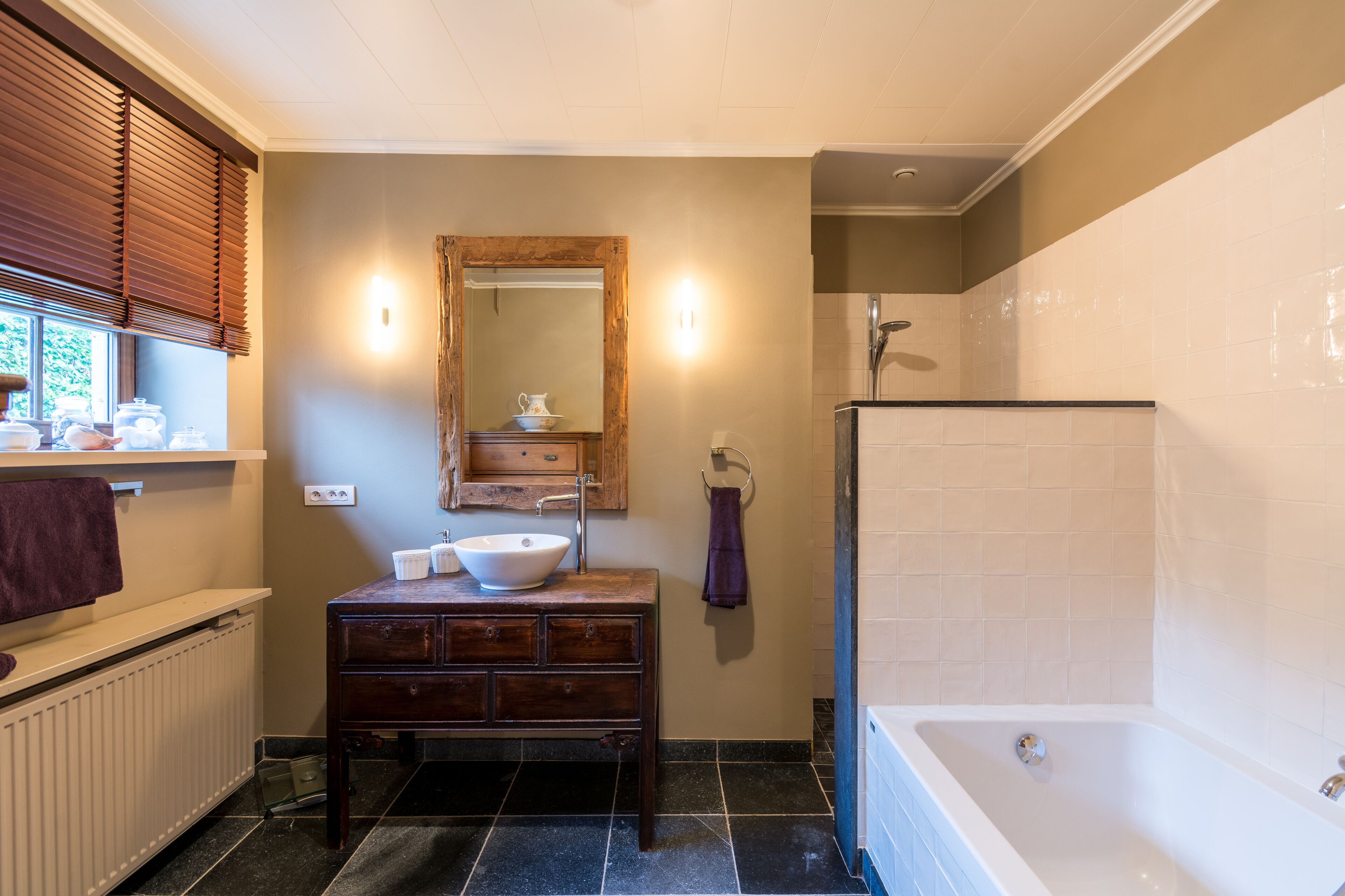 Bathtub, hair dryer, towels, soap