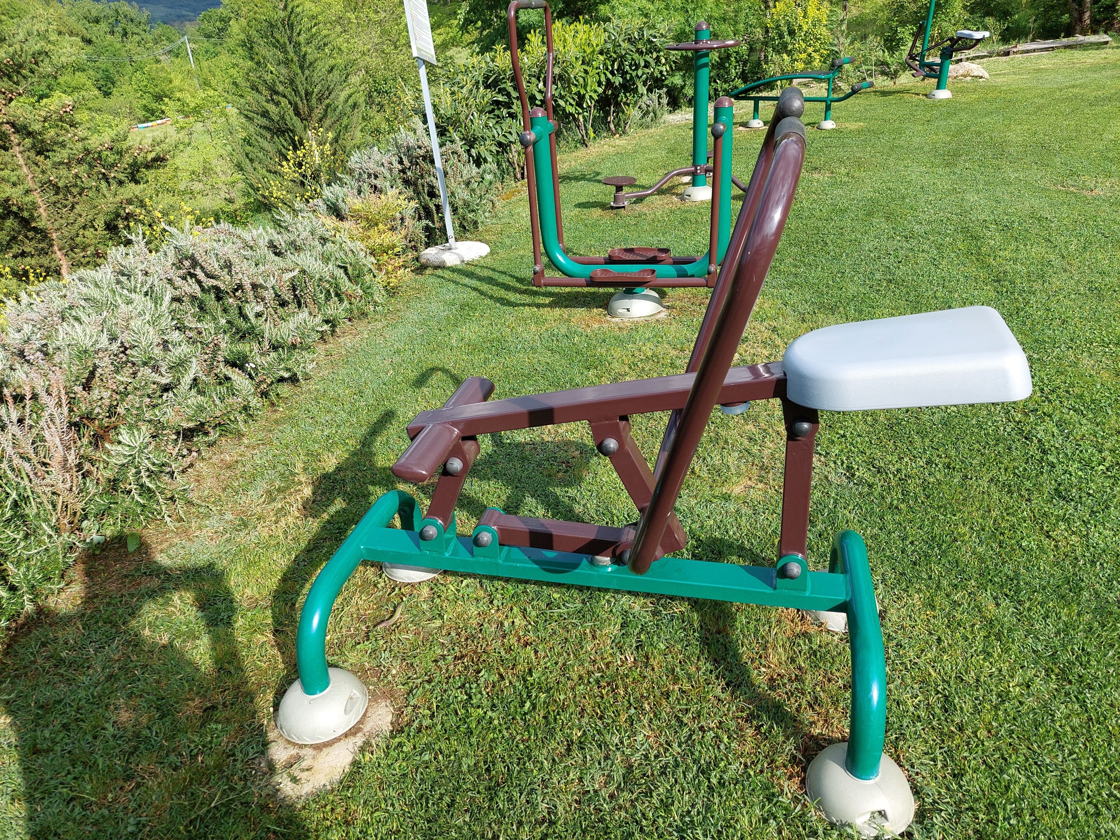 Outdoor exercise equipment in a park.