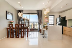 Comfort Apartment, 3 Bedrooms, 2 Bathrooms, Tower | Living room - Trip Apartment Saigon (Ho Chi Minh City)