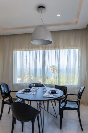 Apartment, 1 Bedroom, Non Smoking | Living room | 56-inch flat-screen TV with satellite channels, TV, Netflix - The Allegro House (Tunis)