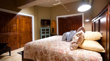 1 habitación, tabla de planchar con plancha y cuna de viaje