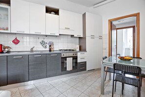 Apartment, 1 Bedroom | Private kitchen | Full-size fridge, stovetop, electric kettle, cookware/dishes/utensils - Cenisio 54 (Milan)