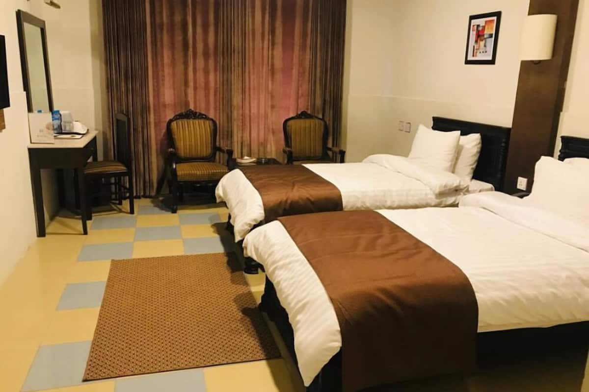 Minibar, bureau, rideaux occultants, chambres insonorisées