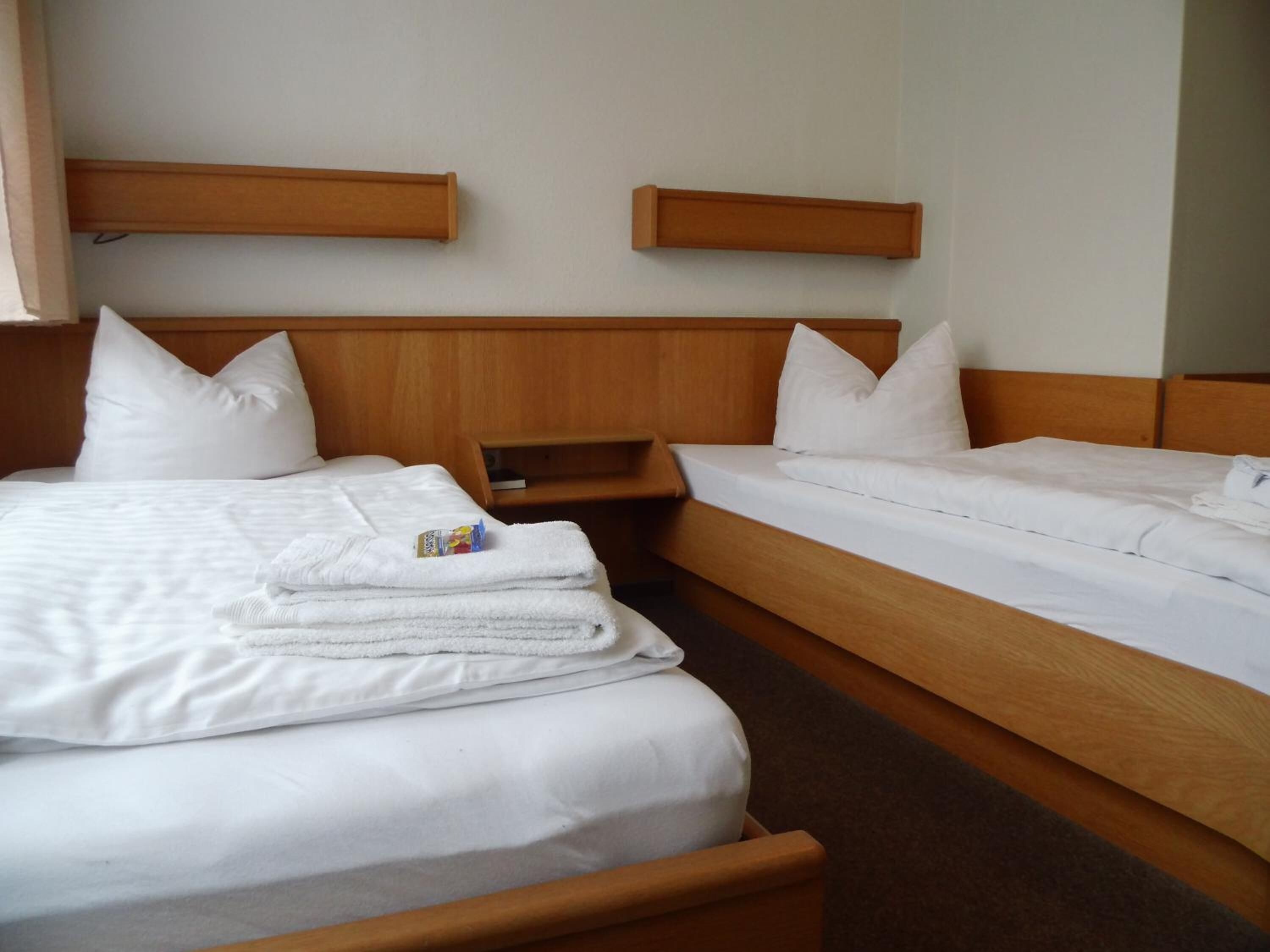 Desk, blackout drapes, soundproofing, rollaway beds