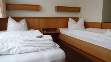 Desk, blackout drapes, soundproofing, rollaway beds