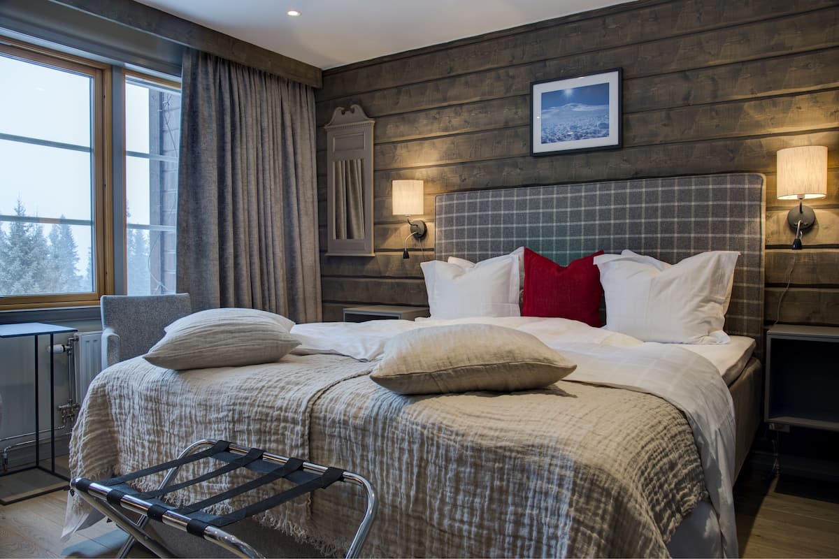 Twin Room (Third person sleeps in extra bed) | Minibar, in-room safe, desk, laptop workspace