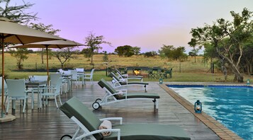 Outdoor pool, pool umbrellas, sun loungers