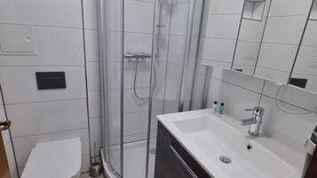 Shower, free toiletries, hair dryer, towels