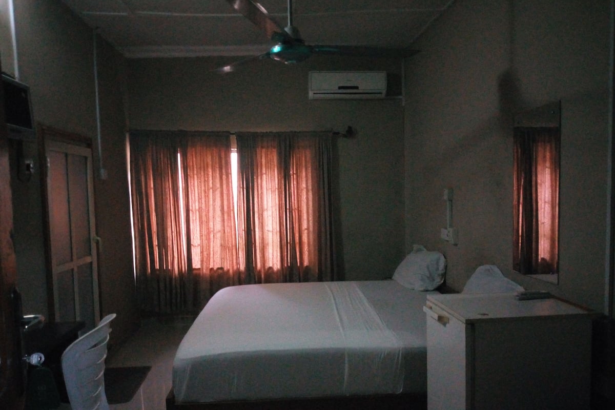 Minibar, desk, bed sheets