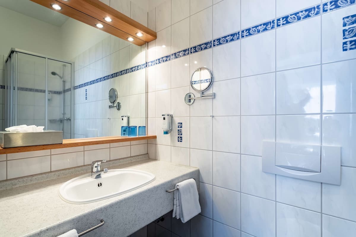 family room | bathroom | shower, hair dryer, towels