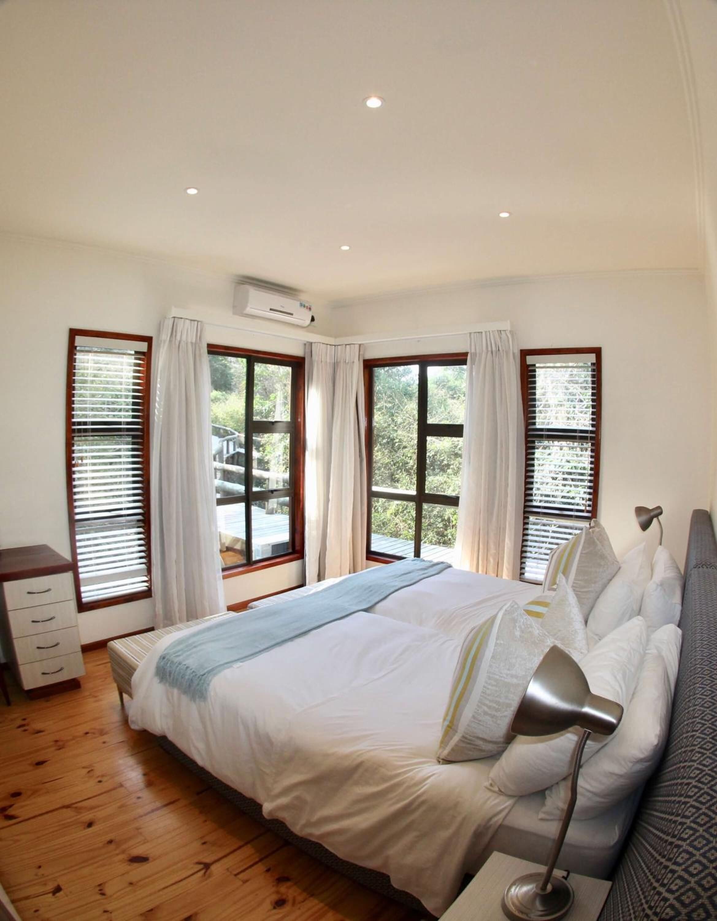 Laptop workspace, blackout drapes, iron/ironing board, bed sheets
