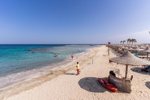 Private beach, sun-loungers, beach umbrellas