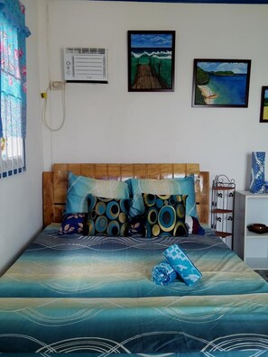 Habitación doble Deluxe, vista al mar | Camas extra y ropa de cama 