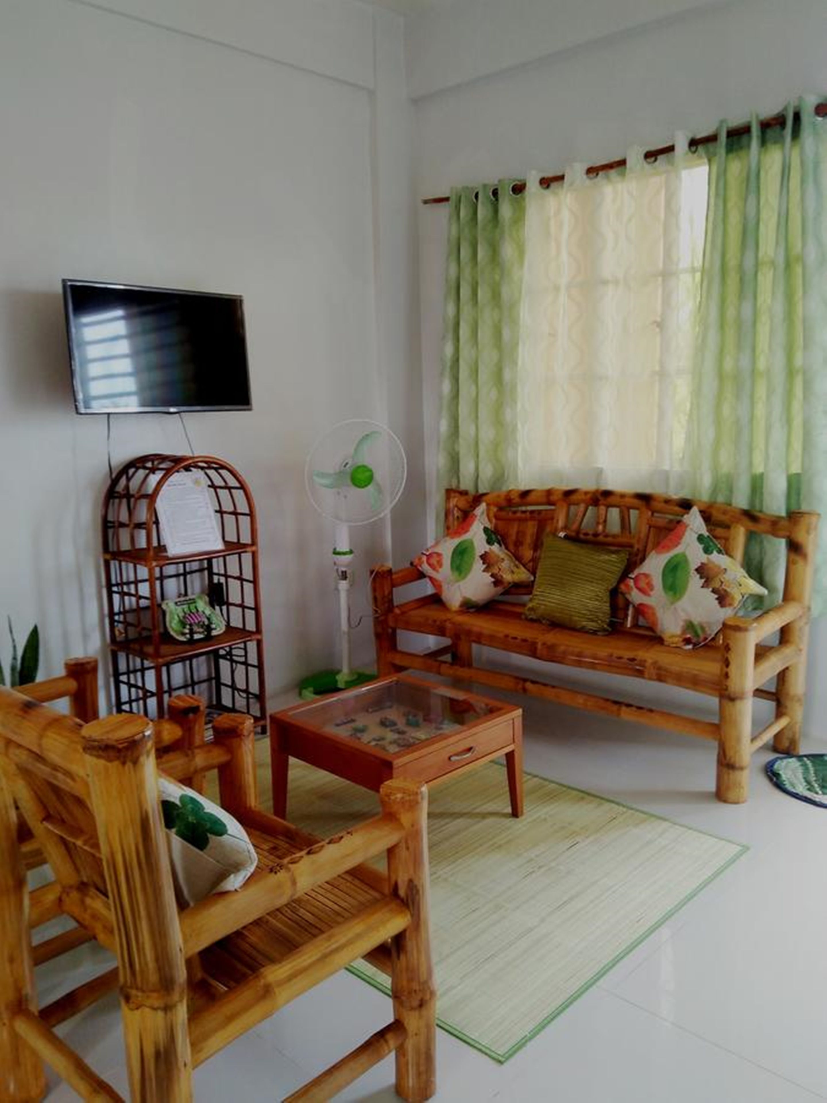 Apartment, 2 Bedrooms (with 1 Double Floor Mattress) | Living room | Flat-screen TV