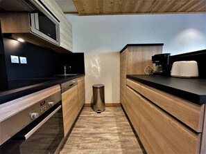 Fridge, microwave, dishwasher, coffee/tea maker