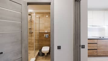 Superior Apartment | Bathroom | Combined shower/tub, deep soaking tub, free toiletries, hair dryer