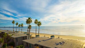 On the beach, sun-loungers, beach towels