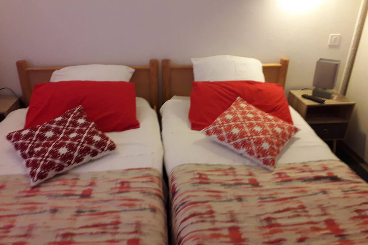Twin Room, 2 Single Beds, Non Smoking | Blackout curtains, iron/ironing board, free WiFi, bed sheets