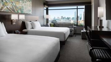Hypo-allergenic bedding, desk, laptop workspace, blackout curtains
