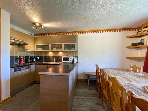 Fridge, microwave, dishwasher, coffee/tea maker