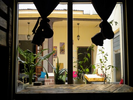 Escritorio, tabla de planchar con plancha, wifi gratis y ropa de cama . Casa I'X - Hostel