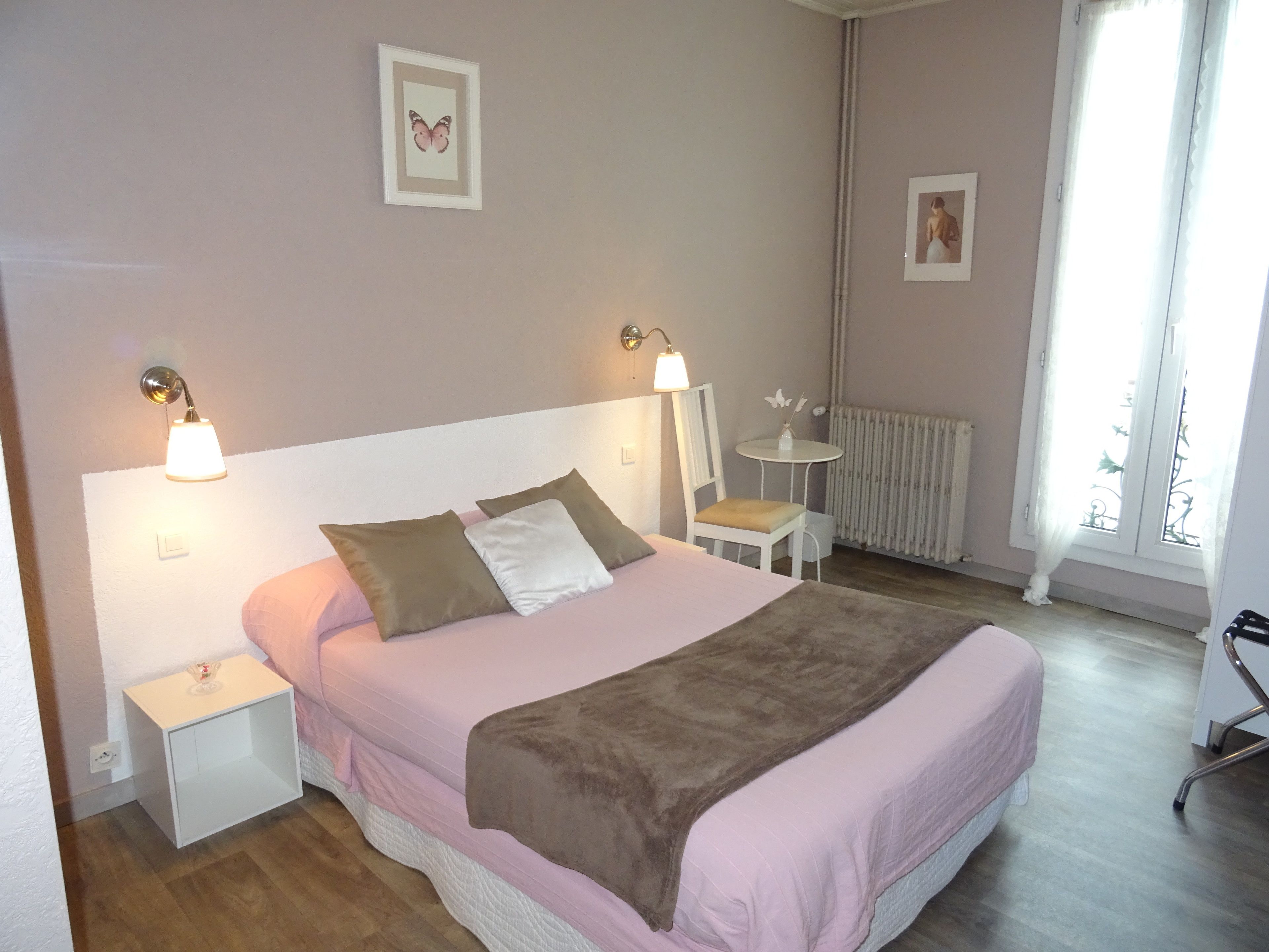 city double room, 1 queen bed, non smoking, city view | individually decorated, individually furnished, desk, blackout curtains