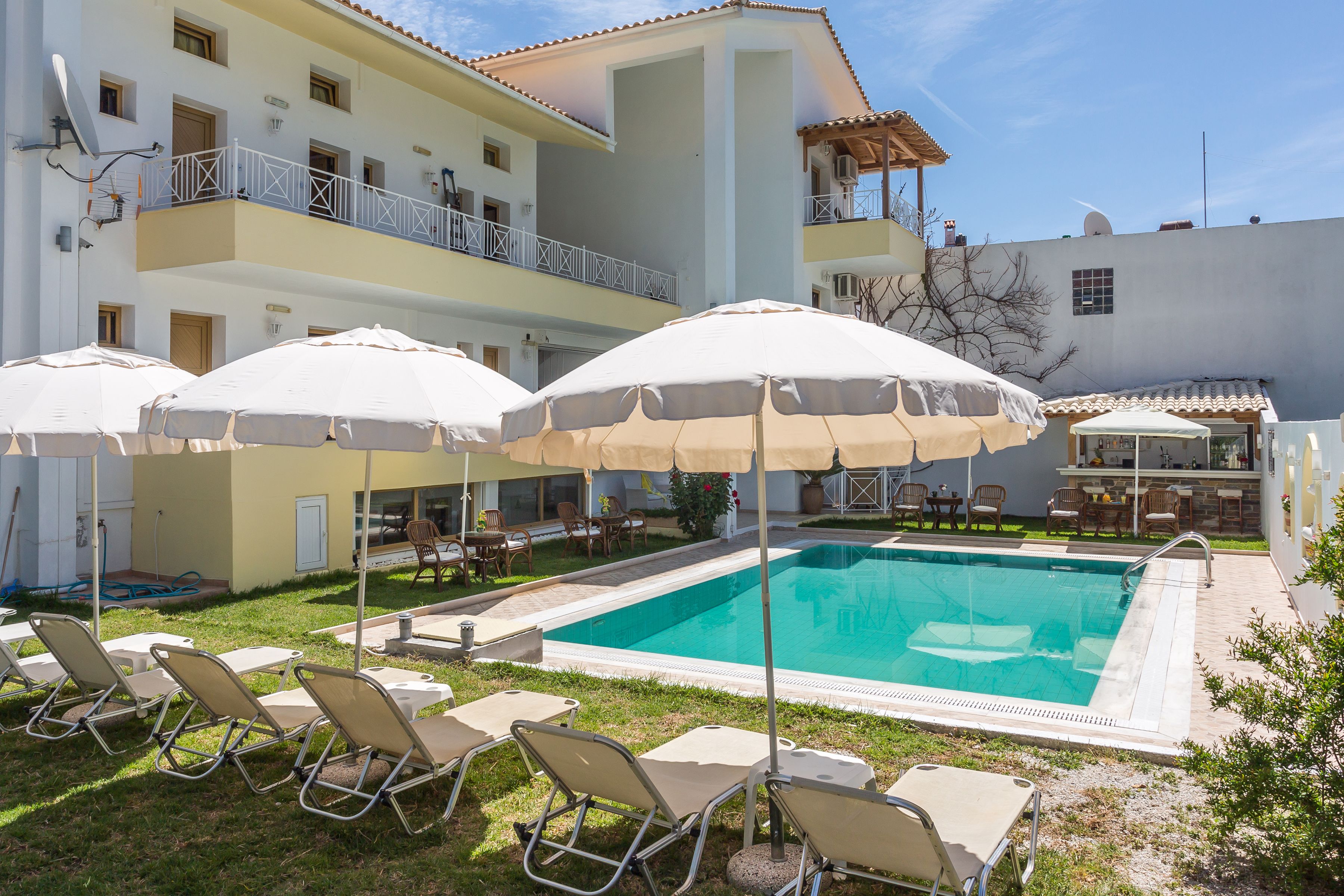 outdoor pool, open 8 am to 8 pm, pool umbrellas, pool loungers