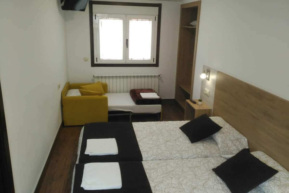 Premium bedding, blackout curtains, soundproofing, free WiFi