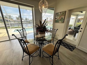 Dining - Waterfront 3BR, heated pool, WiFi, and serene Mid-Island views. (Marco Island)