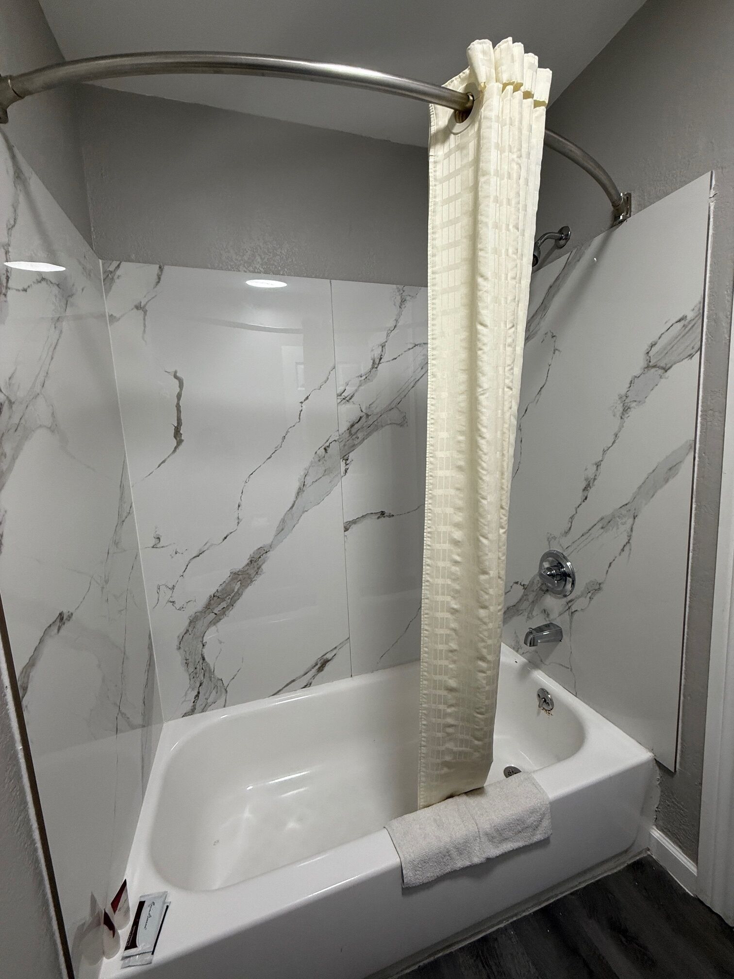 Bathtub, free toiletries, towels, soap
