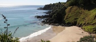 Sandy beach Mahinepua