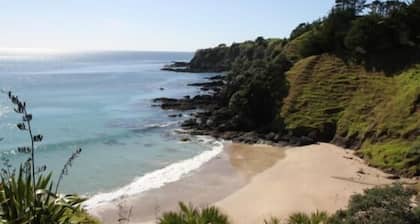 Sandy beach Mahinepua