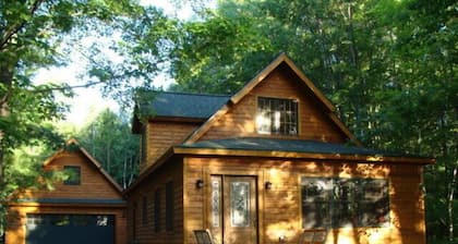 Charming quality built home with private Mullett Lake beach access