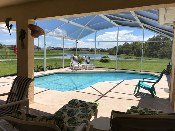 Outdoor pool, a heated pool - Lots of Privacy On A Lake 20 Minutes From Disney With A Private Pool and Spa!! (Kissimmee)