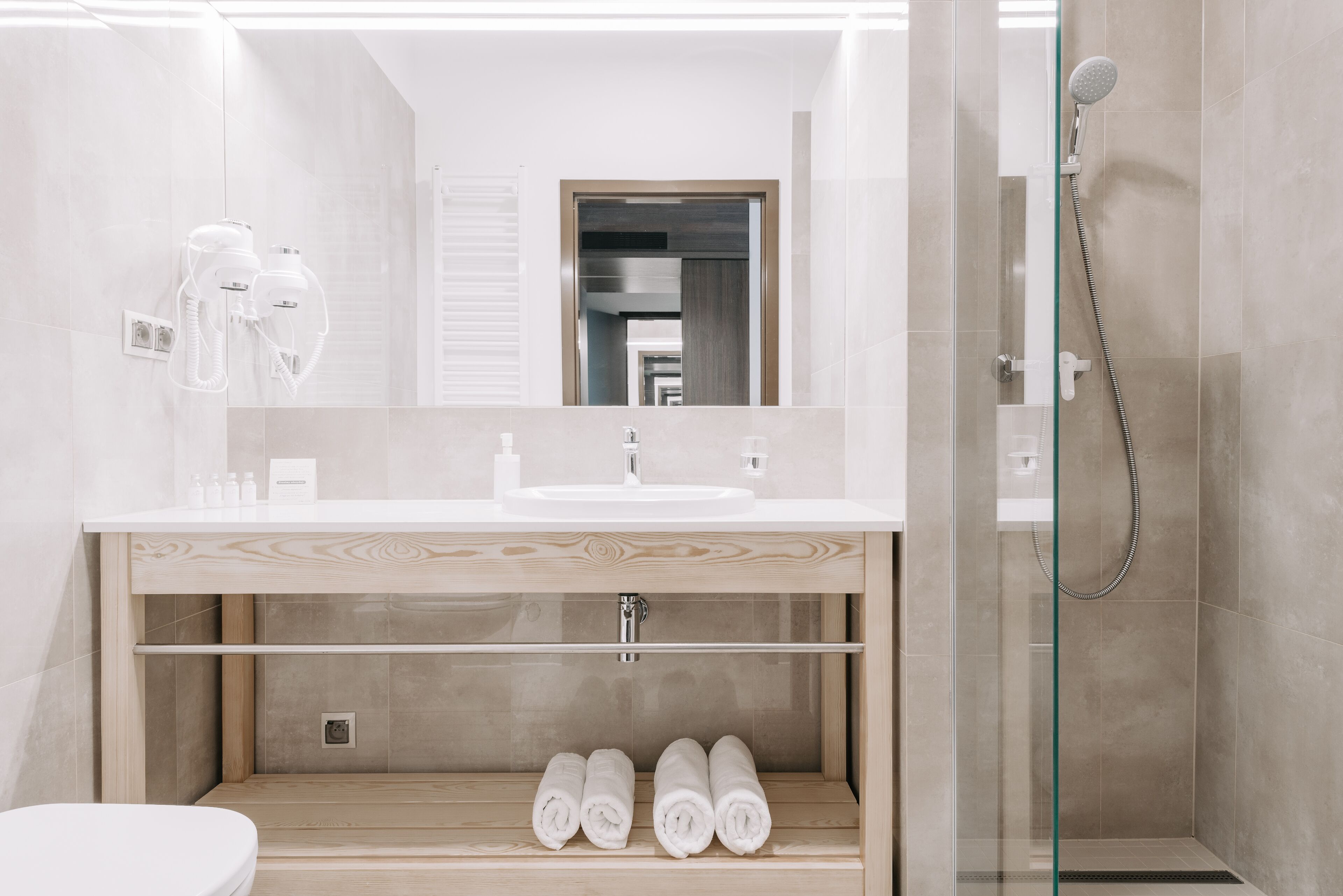 economy double room | bathroom | shower, hair dryer, towels, soap