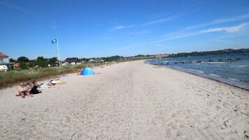 On the beach, sun loungers, beach towels
