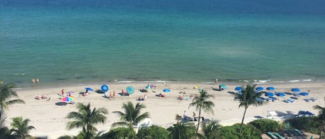 On the beach, sun loungers, beach towels