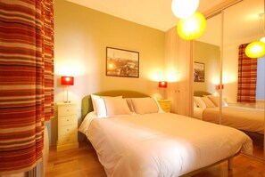 1 habitación, tabla de planchar con plancha, wifi gratis y ropa de cama 