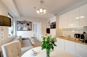 Apartemen Comfort | Area keluarga | Televisi layar datar 32-inci dengan saluran TV kabel dan TV