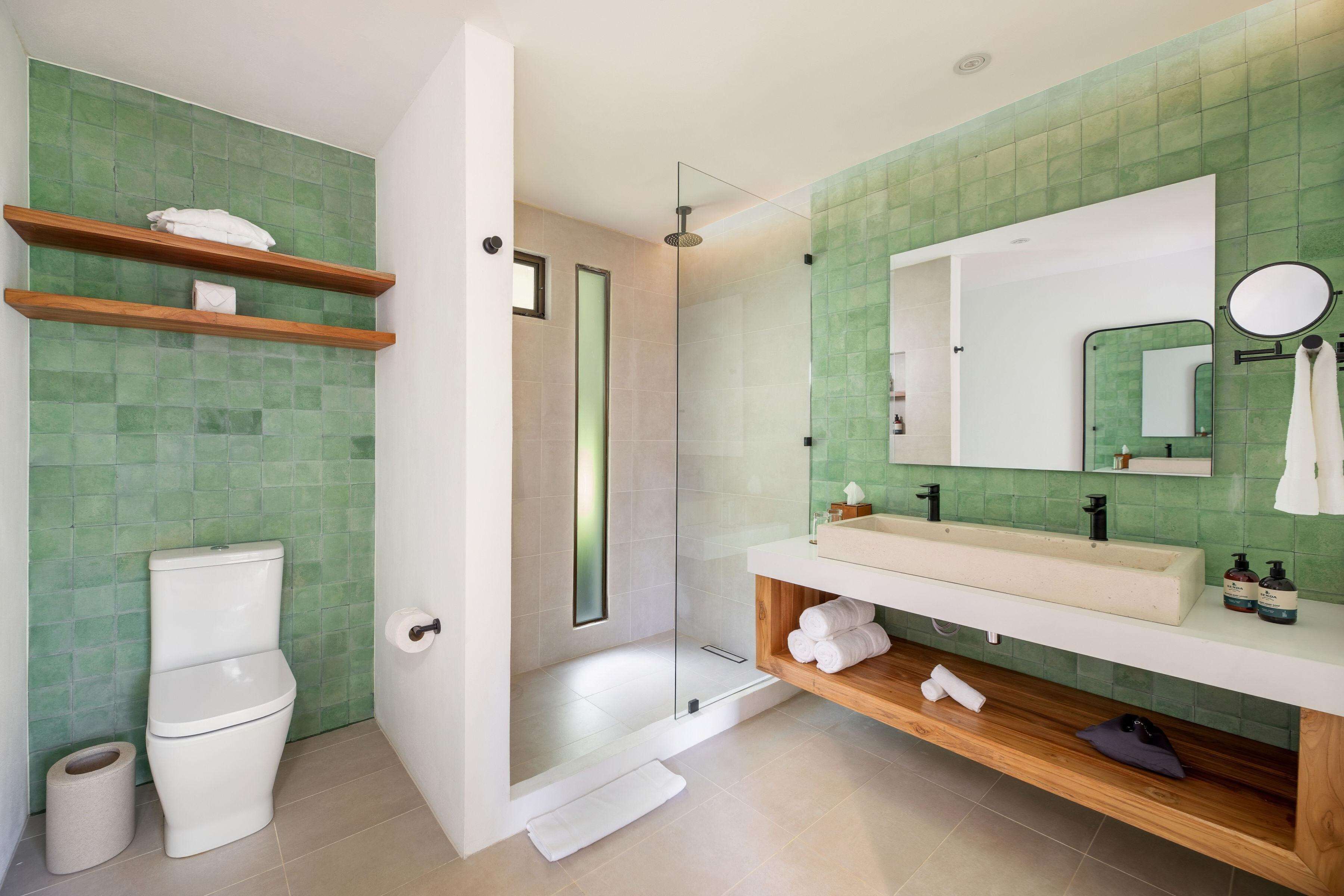 junior suite, 1 king bed with sofa bed, non smoking | bathroom | free toiletries, hair dryer, bathrobes, bidet