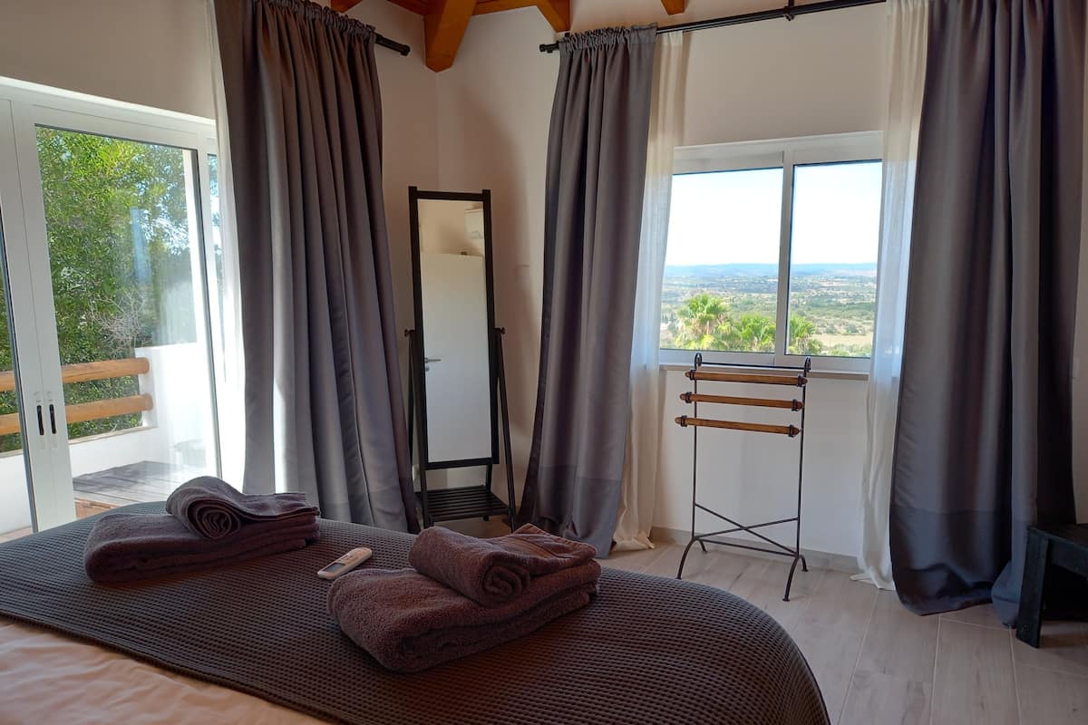 Apartamento, 1 quarto (Carlos) | 1 quarto, cortinas blackout, ferros/tábuas de passar roupa