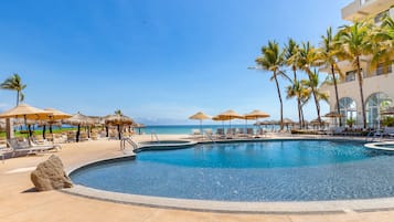 2 outdoor pools, pool umbrellas, sun loungers