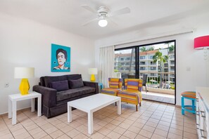 Superior One Bedroom Suite | Living area | 32-inch LCD TV with cable channels, TV, DVD player - Villa del Palmar Beach Resort and Spa - All Inclusive (Puerto Vallarta)