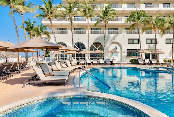 2 outdoor pools, pool umbrellas, sun loungers