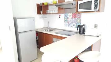 Apartemen, 2 kamar tidur, kamar mandi pribadi | Dapur pribadi | Lemari es besar, microwave, oven, dan kompor