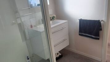 Shower, hair dryer, soap, shampoo
