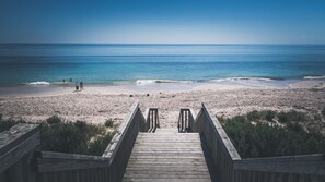 A wooden boardwalk leading to a beach with a clear view of the ocean. - South Shores Villa 52 - South Shores Normanville (NORMANVILLE)