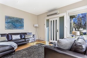 Spacious living room..Reverse cycle heat pump in the open plan living areas.