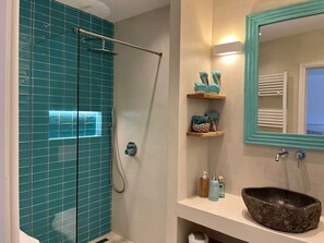 Bathtub, hair dryer, towels